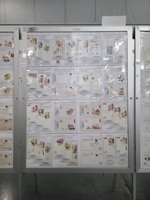 The Release and Use of Unsurcharged 1997 China Post Ordinary-Type New Year (Lottery) Stamped Postcards — frame 6135, exhibited by Ma Yuanying